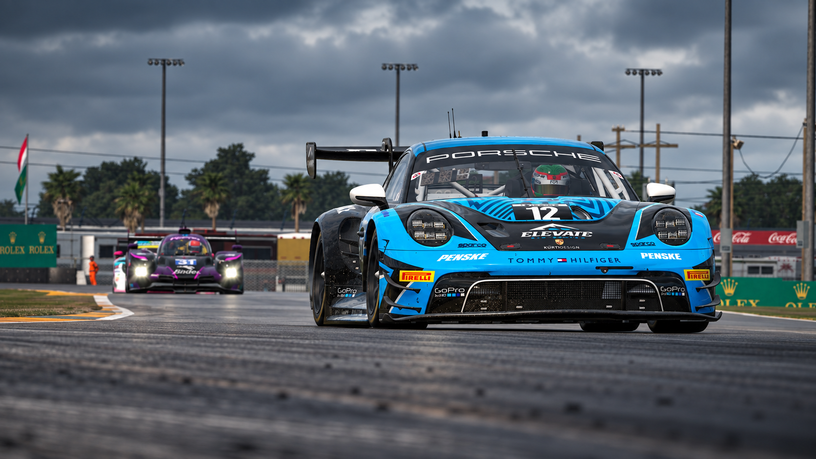 Elevate Sim Racing’s blue and black number 12 Porsche racing on track